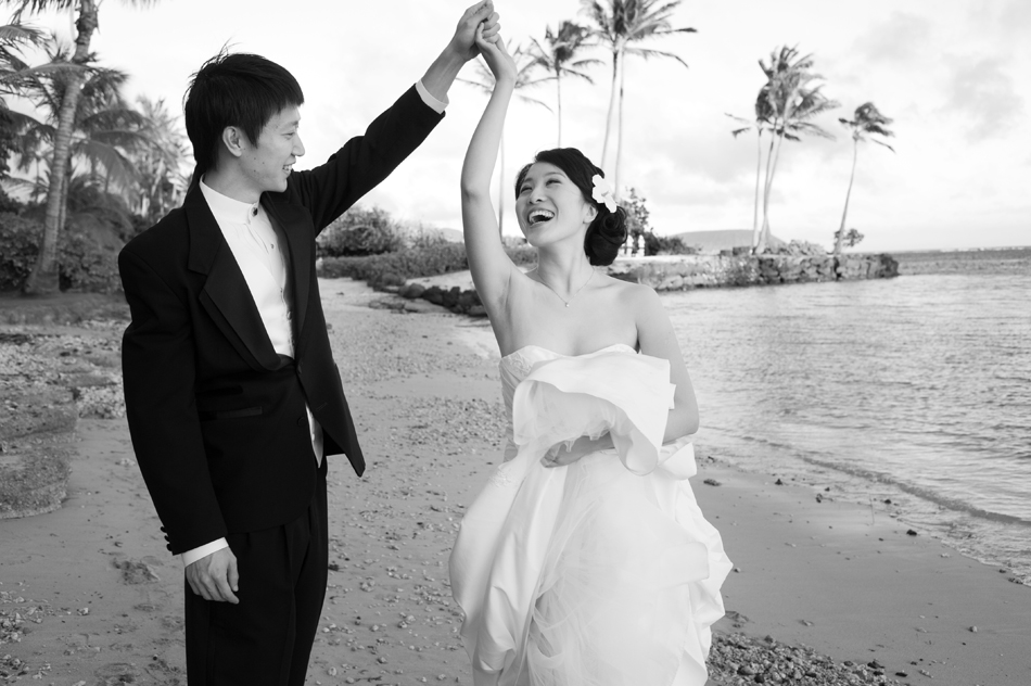 Bride and Groom Dancing on the Beach