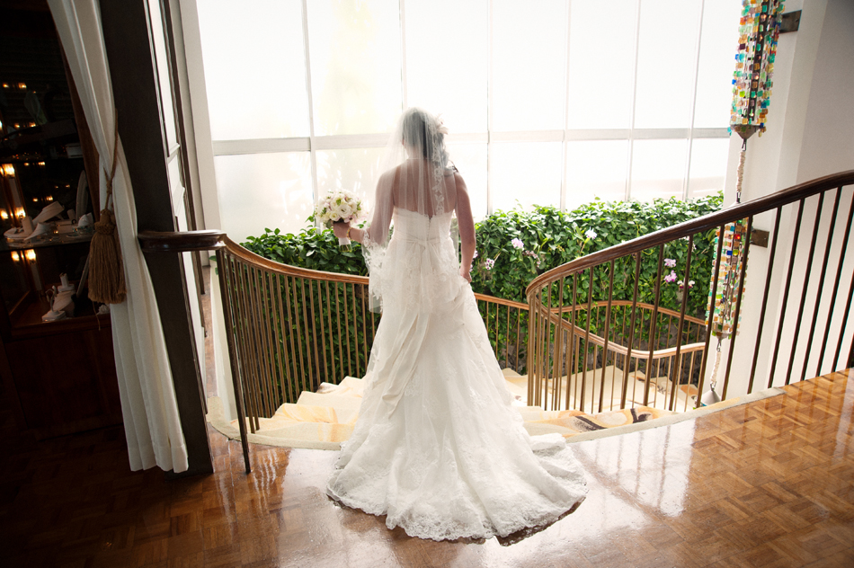 Bride Walking Down Orchid Staircase