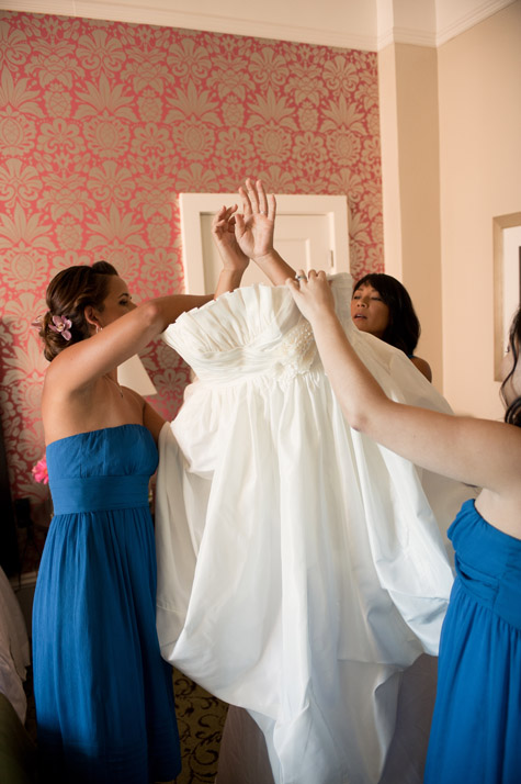 Bride Getting into Dress