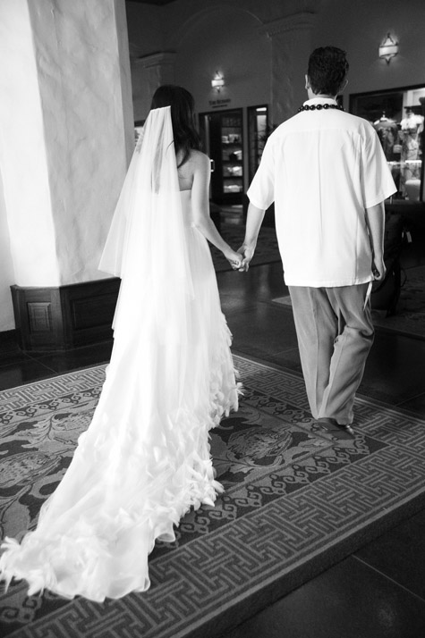 Bride and Groom walking through Lobby of Royal Hawaiian