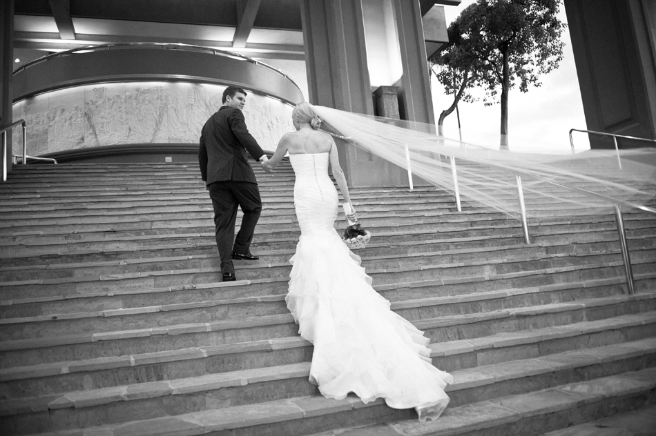 Bride and Groom walking up Waikoloa Steps