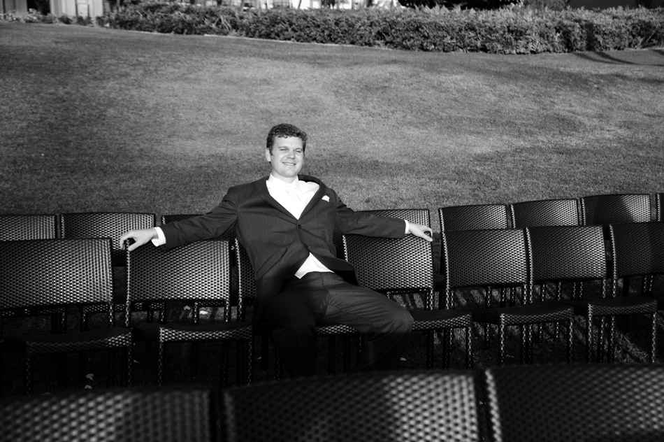 Groom Relaxes after Ceremony