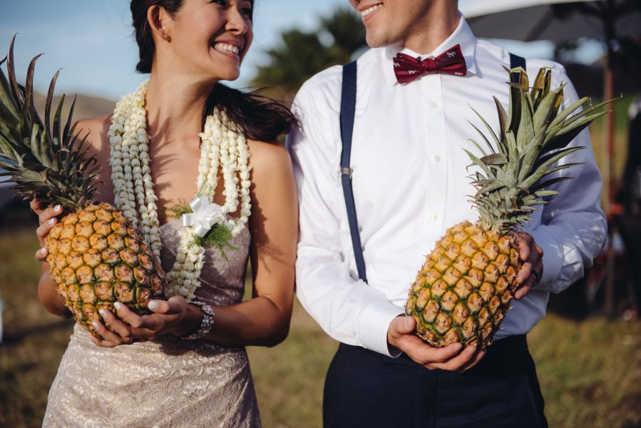 Bride & Groom Holding Pineapples