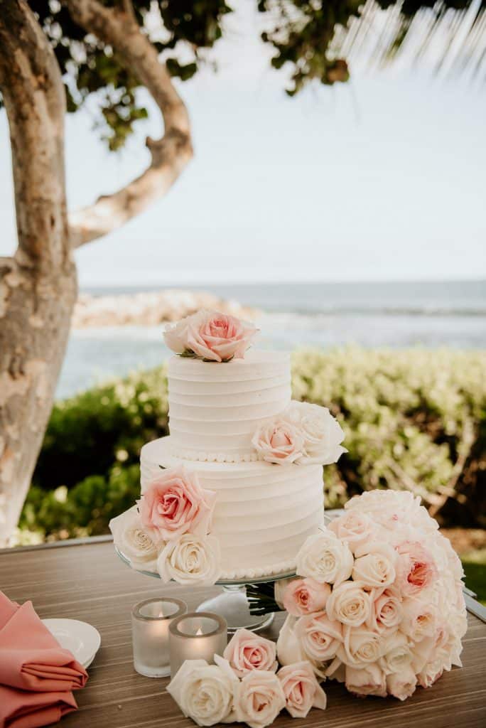 Wedding Cake covered in Pink and White Roses at Four Seasons Koolina