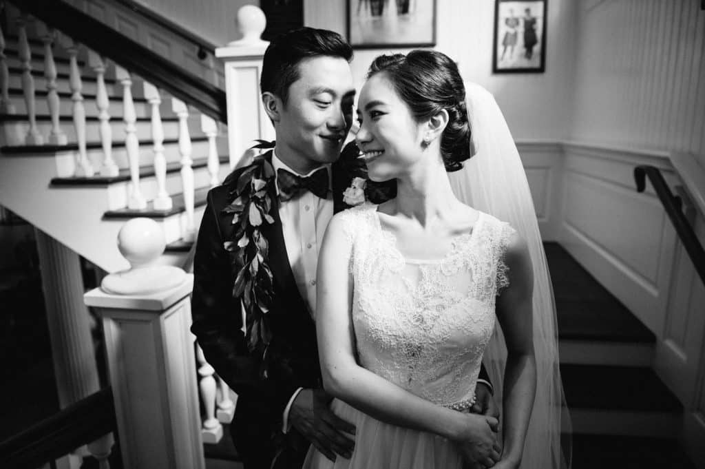 Intimate Black and White portrait of Bride and Groom on Moana Staircase