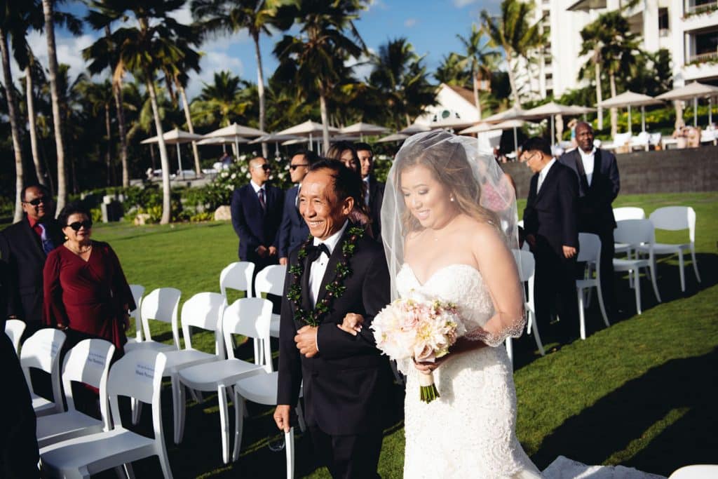 Father of Bride giving bride away at Four Seasons Resort Oahu