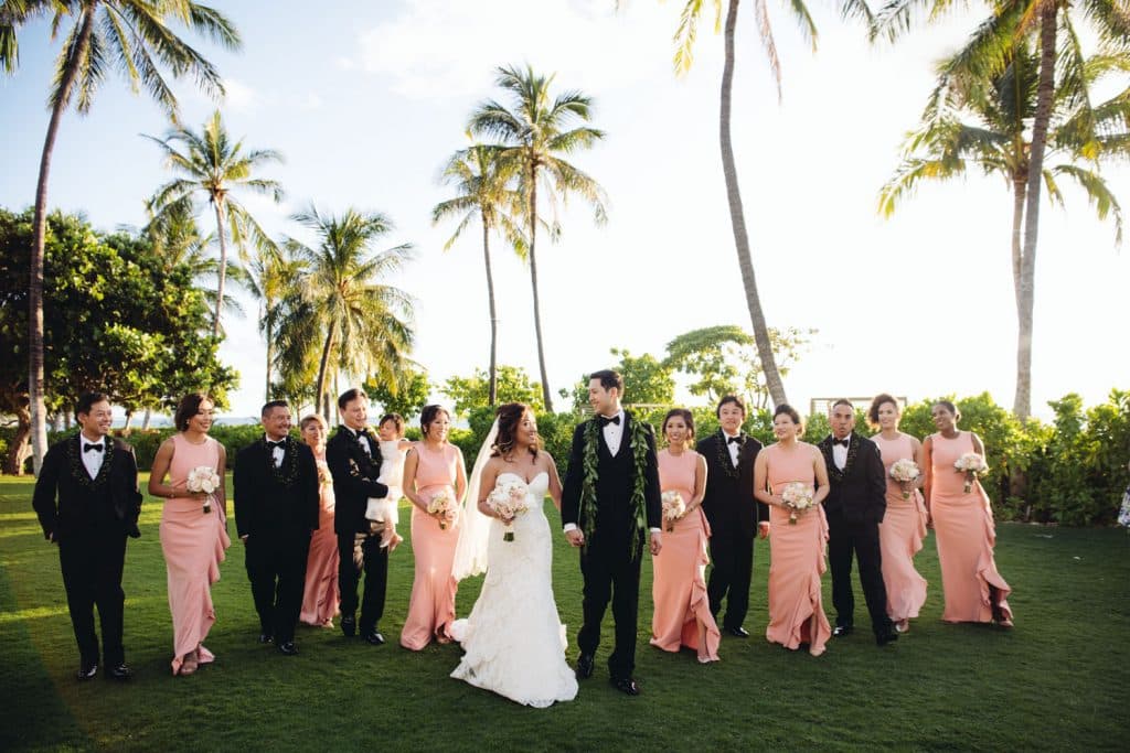 Bridal Party Walking on Lawn of Four Seasons Resort Oahu at Koolina