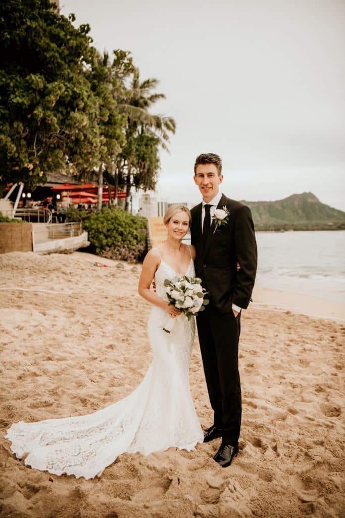 Bride and Groom on Beach fronting Halekulani Hotel