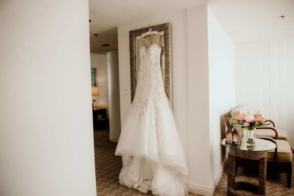 Wedding Dress hanging on mirror at Royal Hawaiian Hotel