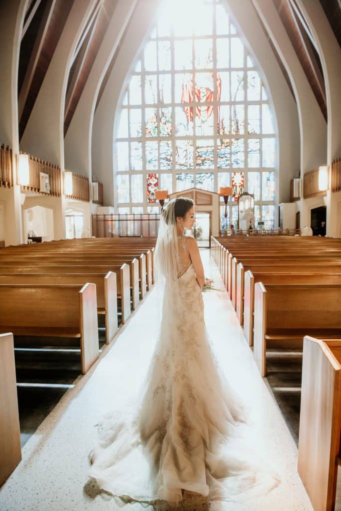 Bridal Portrait inside of St. Augustine with Stain Glass in background