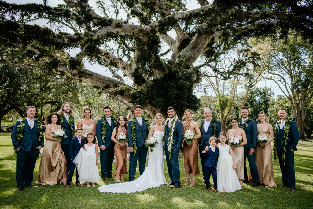 Bridal Party photographed in the shade in front of large tree at Dillingham Ranch.