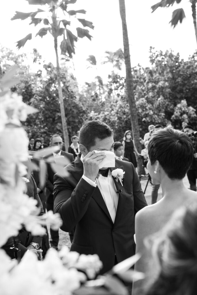 Black and White image of emotional moment with groom at the Ceremony.