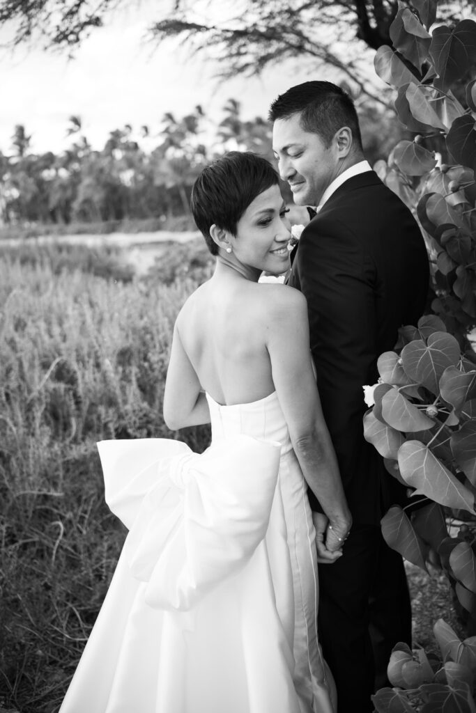 Black and White image of Bride and Groom moment on Secret Beach.
