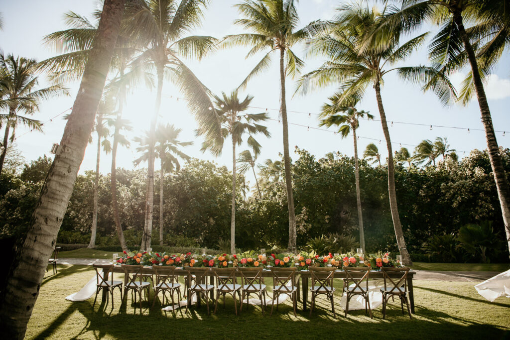 Reception Table at Sunset with palm trees in background.