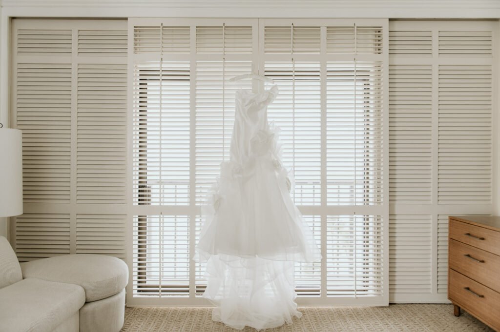 Elegant wedding dress in Halekulani Hotel suite.