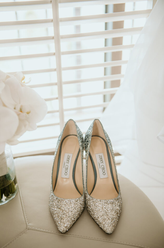 Jimmy Choo wedding shoes and bride's bouquet.