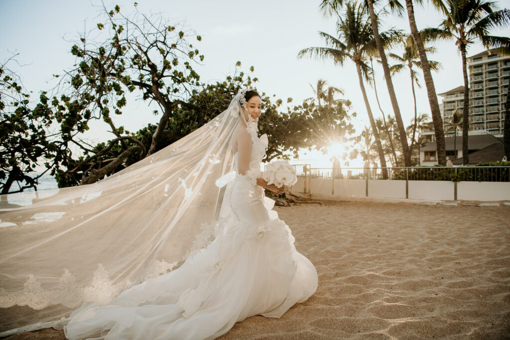 Bridal Portrait in front of Waikiki Beach and Halekulani Hotel.