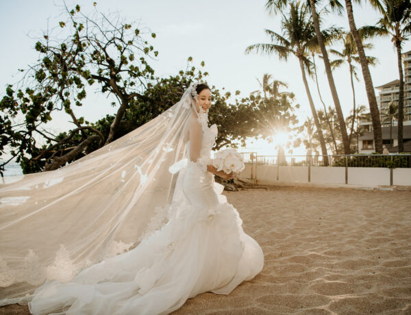 Bridal Portrait in front of Waikiki Beach and Halekulani Hotel.