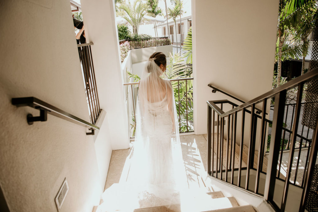 Bride walking down Hau Terrace steps for first look