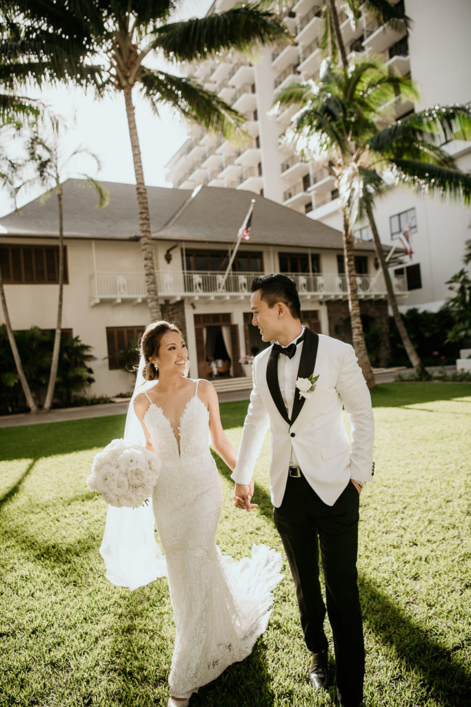 Bride and Groom at one of Hawaii's Top Wedding Venues Halekulani Hotel