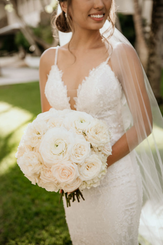 Close up of Bride's White Rose Bouquet