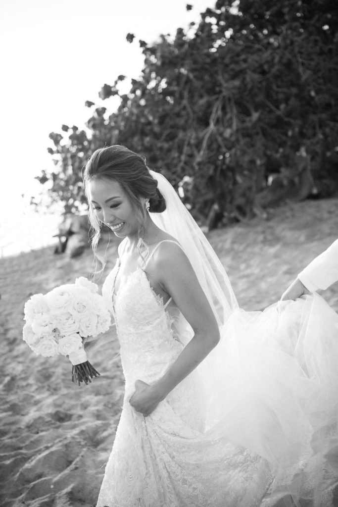 Black and White of Bride walking down towards Waikiki Beach