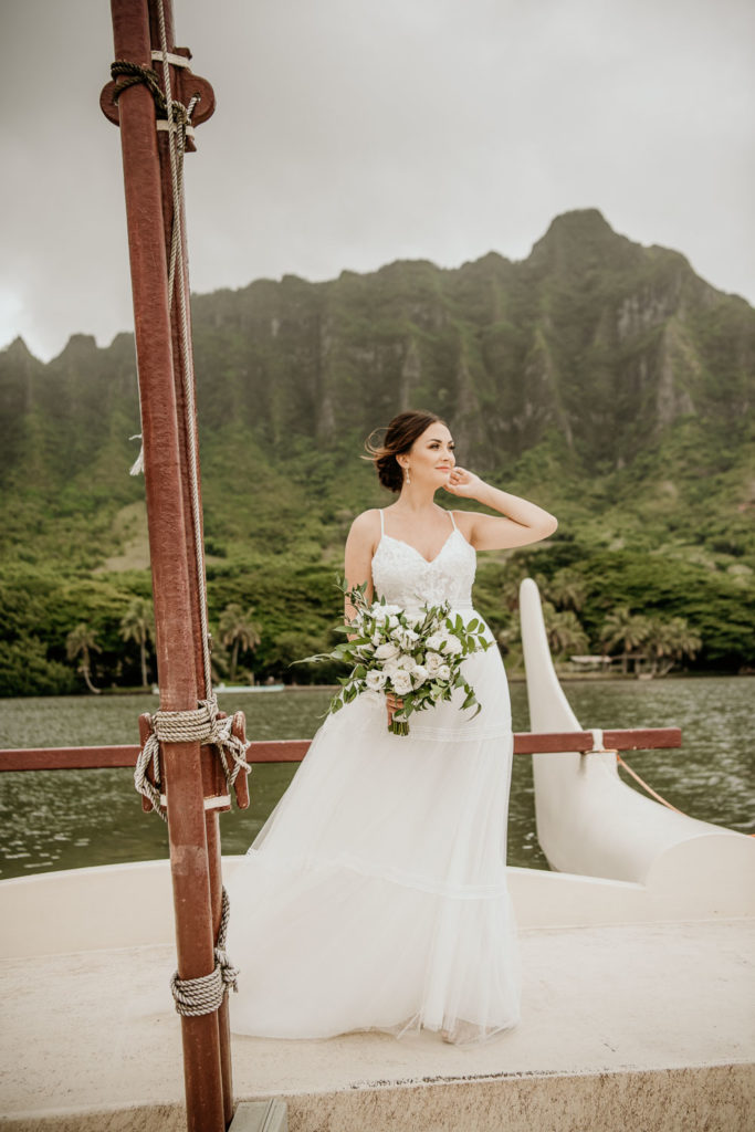 Bridal Portrait on boat with Kualoa Ranch in background
