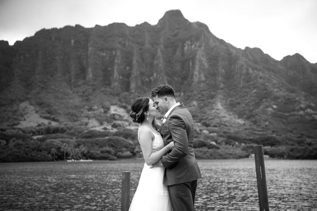 Bride and Groom kissing on Dock at Secret Island
