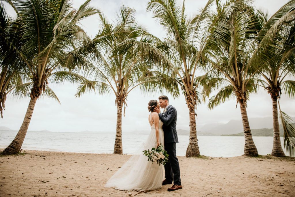 Bride and Groom kissing at Secret Island Beach