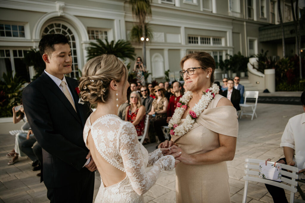 Mother of the Bride giving Bride away to groom at the Moana Surfrider.