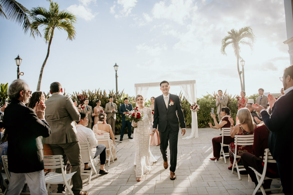 Bride and Groom recessional at the Moana Surfrider.