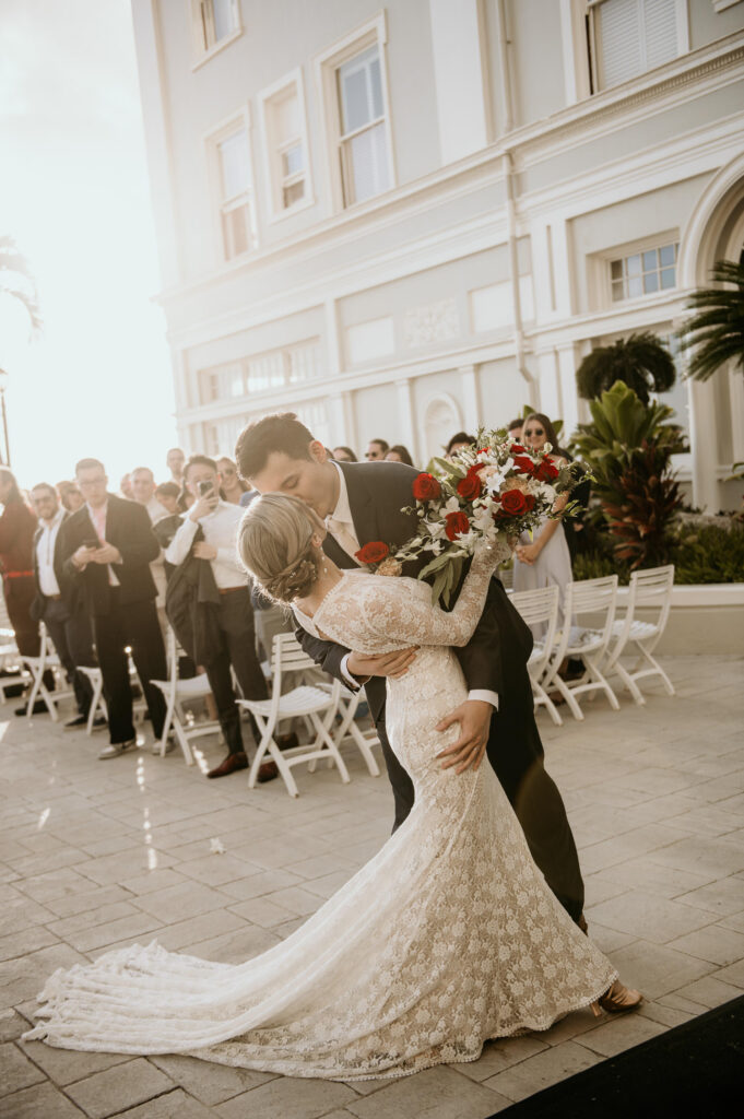 The kiss at the end of the aisle at the Moana Surfrider.