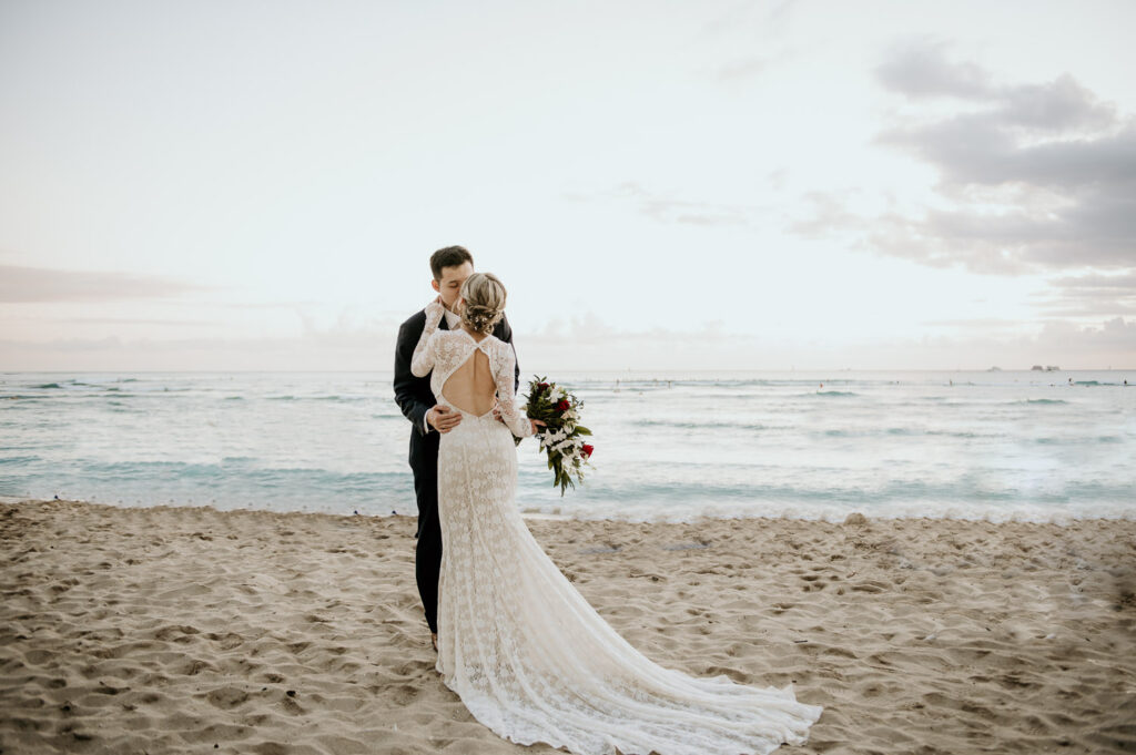 Bride and Groom portrait with Waikiki Beach in the background.