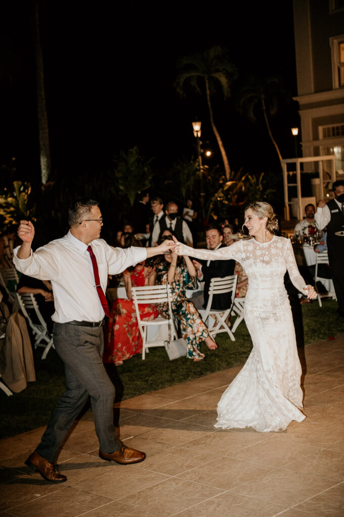 Father of Groom dancing with bride at the Diamond Head Lawn.