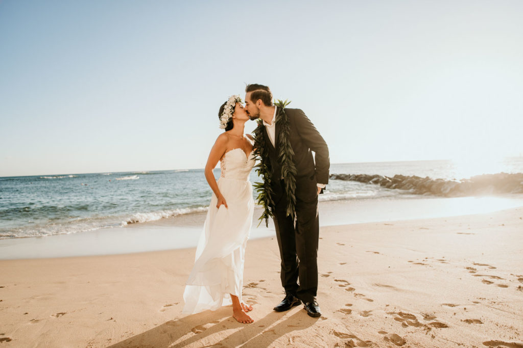 Bride and Groom Kiss on Waikiki Beach